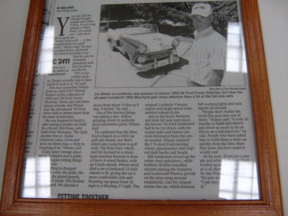 Framed newspaper article from The Wichita Eagle about a classic 1955-56 Ford Crown Victoria restorer
