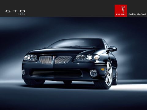 1998 Mercury Sable - Front view of a black 2004 Pontiac GTO, its distinctive grille and headlights.