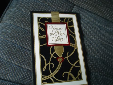 1989 Ford F-250 - A greeting card with ornate gold scrollwork is shown resting on a dark, textured surface.