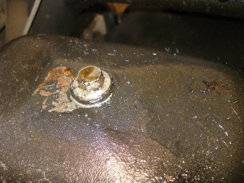 1989 Ford F-250 - The oil pan drain plug appears to be leaking oil.
