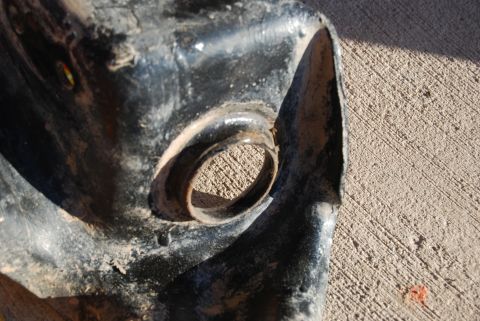 1982 Ford Bronco - This is a close-up view of a single, heavily corroded metal automotive component.
