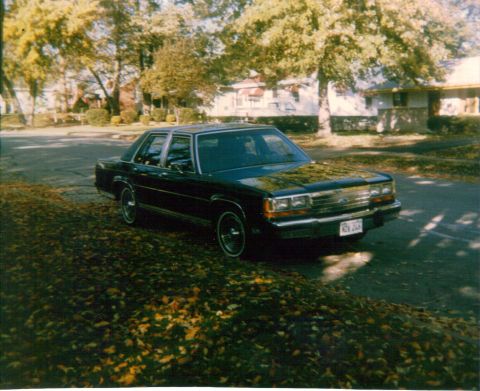 2006 Mercury Grand Marquis - Emma II; dk. blue 1990 Ford Crown Victoria