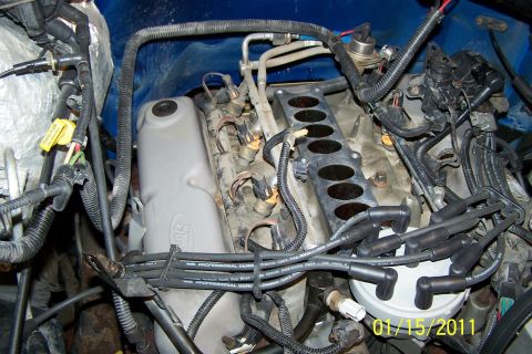 1996 Ford Bronco - PCV grommet in valve cover, under upper intake