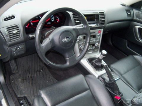 2006 Subaru Legacy - The interior of a 2006 Subaru Legacy features a manual transmission and black leather seats.