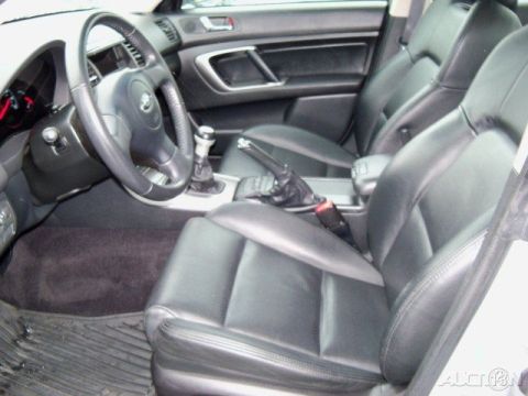 2006 Subaru Legacy - The interior of a 2006 Subaru Legacy features black leather seats and a detailed dashboard.