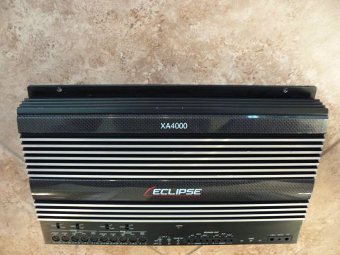 1978 Ford Bronco - Eclipse XA4000 amplifier shown with various control knobs and speaker outputs visible on the front panel.