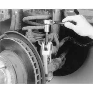 1992 Ford Bronco - Use a tie rod end puller tool to remove the ball stud from the Pitman arm