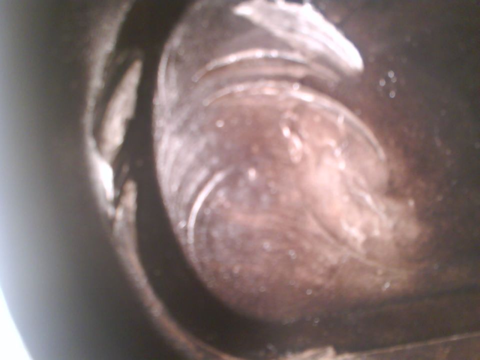 Close-up of damaged piston interior