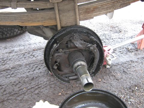 1972 Ford F-250 - The brake drum assembly shows significant wear and grease buildup.