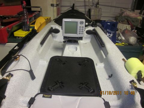 1953 Ford Mainline - Kayak interior view shows a fish finder mounted on the console and a paddle resting on the side.