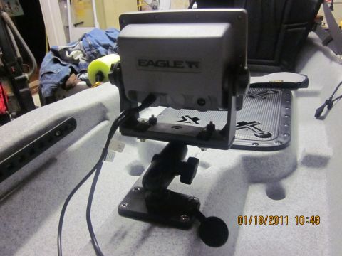 1953 Ford Mainline - Fish finder unit with 'EAGLE' logo mounted in a kayak.
