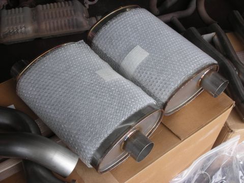 2004 Ford Crown Victoria - New exhaust mufflers and pipes are packaged for installation.