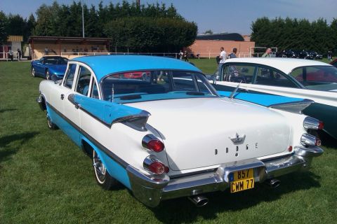 1991 Ford LTD Crown Victoria - This two-tone 1959 Dodge Custom Royal features distinctive tail fins and a prominent chrome bumper.