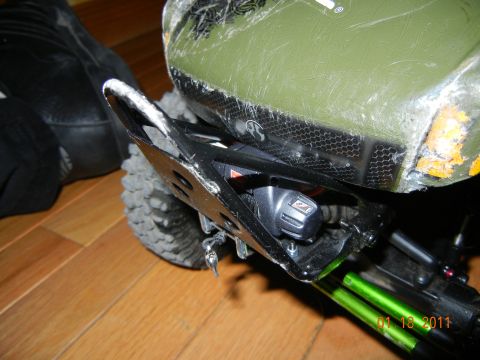 1996 Ford Bronco - A close-up view of a component on an RC car, showing intricate details of its construction.