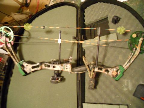 1992 Jeep Cherokee - A compound bow, complete with sights and stabilizers, is stored in its protective case.