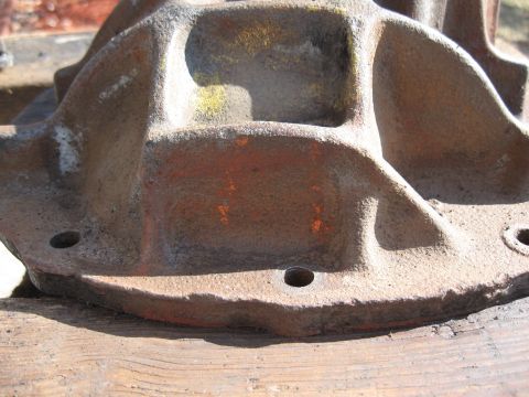 1968 Shelby GT500 - A close-up view of a weathered differential housing, showing signs of age and previous paint.