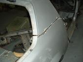1985 Chevrolet Camaro - Body panel seam on a car undergoing repair or restoration.
