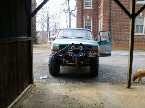1996 Ford Bronco - This 1996 Ford Bronco features a custom front bumper with a winch and off-road tires.