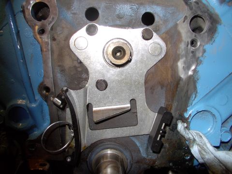 1982 Chrysler New Yorker - Oops you're done. Yes it's just three bolts and it replaces your original thrust plate and that little pointed tang just about the crank en…