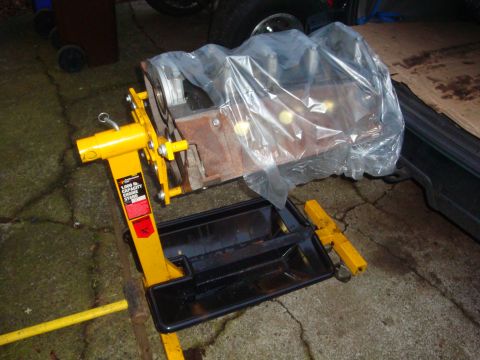 1989 Ford Bronco - Engine block on a stand, ready for rebuild or transport.