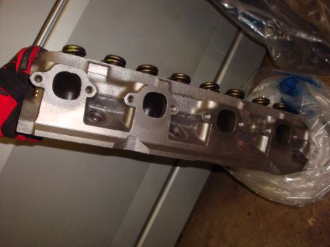 1989 Ford Bronco - Close-up of an engine cylinder head, likely for a Ford vehicle.