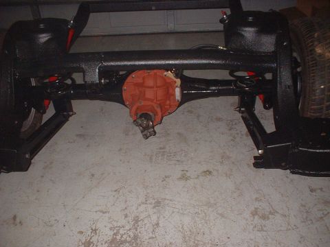 1967 Ford Galaxie - Rear axle assembly components, including the differential and suspension parts, are visible.