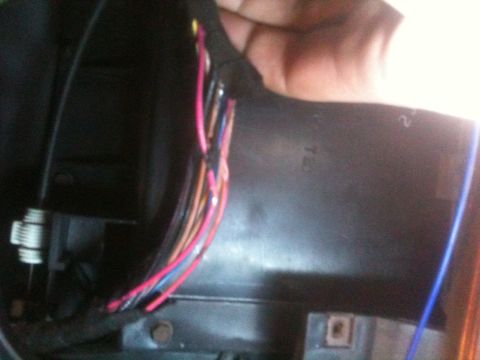 1993 Ford Bronco - Wiring harness with multiple colored wires visible, connected to a black plastic component.