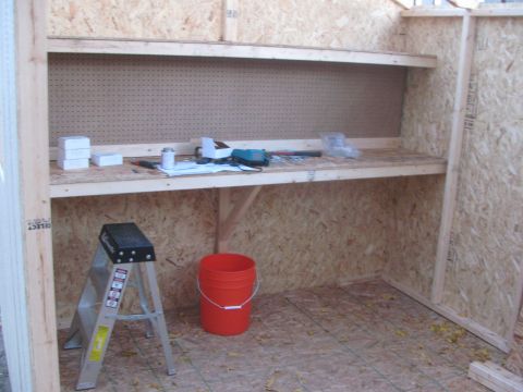 1968 Ford Mustang - Workbench and tools are visible in a room that appears to be under construction.