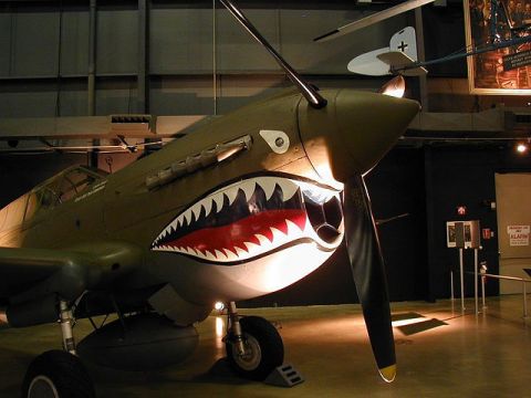 1972 Ford Ranchero - This Curtiss P-40 Warhawk, famous for its shark mouth nose art, is displayed indoors.