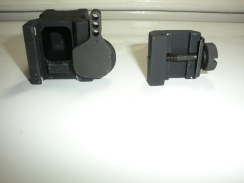1996 Ford Bronco - Two black gun sight components are shown, one with 'USA' marking.