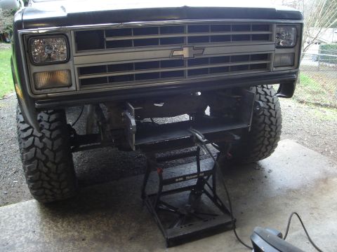 1989 Ford Bronco - This Chevrolet truck's front end features a distinctive grille and large tires, suggesting an older model year.