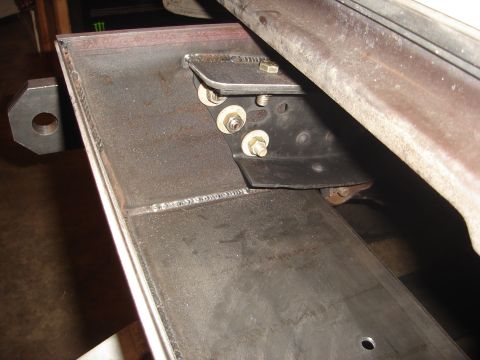 1989 Ford Bronco - Close-up of a custom trailer hitch receiver mount, showing welded steel construction.