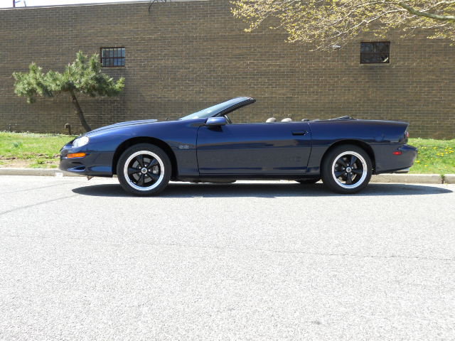 Dark blue 2001 Chevrolet Camaro convertible parked on asphalt