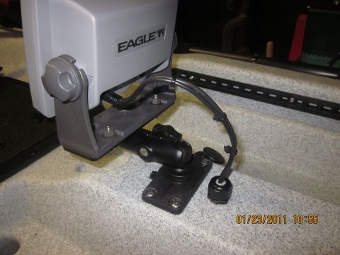 1953 Ford Mainline - Close-up of an Eagle fish finder mount with visible text and date stamp.