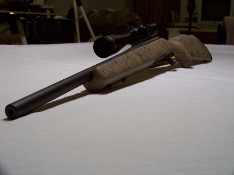 1995 Mercury Grand Marquis - A rifle with a scope is shown resting on a white surface, with a watermark for SuperMotors.net at the bottom right.