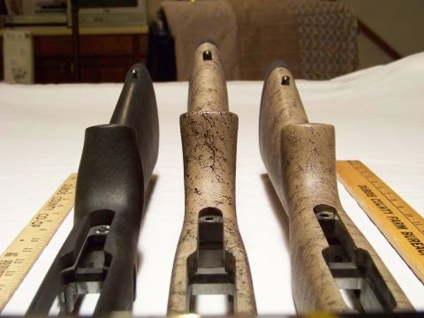 1995 Mercury Grand Marquis - Three rifle stocks are displayed with rulers to show their dimensions. The registry incorrectly identifies this as a 1995 Mercury Grand Mar…
