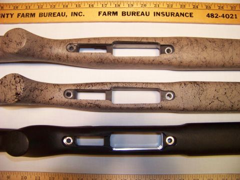 1995 Mercury Grand Marquis - Two speckled tan and one black gun stock are displayed with rulers for scale.