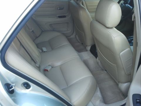 2008 Subaru Legacy - The interior of a car is shown, focusing on the rear seating area and door panel.