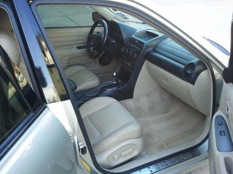 2008 Subaru Legacy - Interior view of a car, showing the driver's seat, dashboard, and center console.