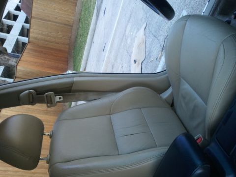 2008 Subaru Legacy - Interior view of a car's front passenger seat and dashboard area.