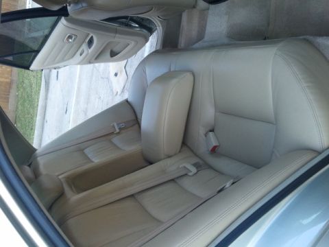 2008 Subaru Legacy - Interior view of a car showing the rear seating area and door panel.