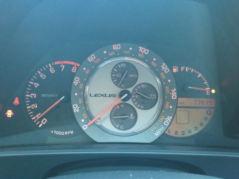 2008 Subaru Legacy - Dashboard gauges with 'Lexus' branding visible, displaying various vehicle metrics.