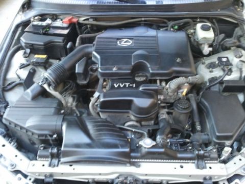 2008 Subaru Legacy - Engine bay detail showing the VVT-i engine cover and associated components.