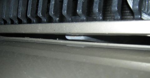 2000 Mercury Grand Marquis - Detail shot of the front grille and bumper area on a 2000 Mercury Grand Marquis.