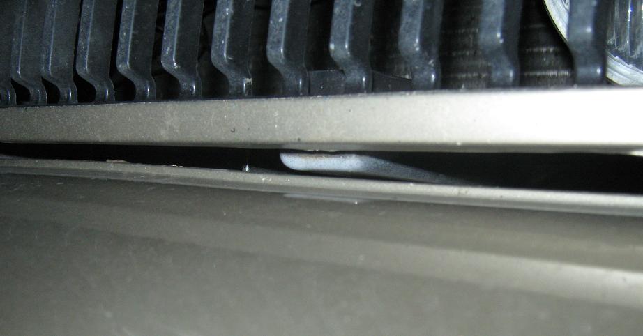 Close-up of 2000 Mercury Grand Marquis grille and bumper detail