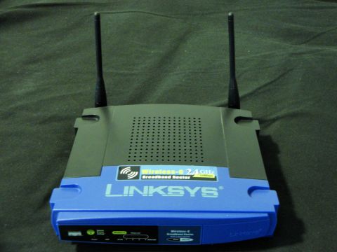 1993 Ford Taurus - This Linksys broadband router features wireless-B 2.4 GHz connectivity and multiple ports on the front panel.