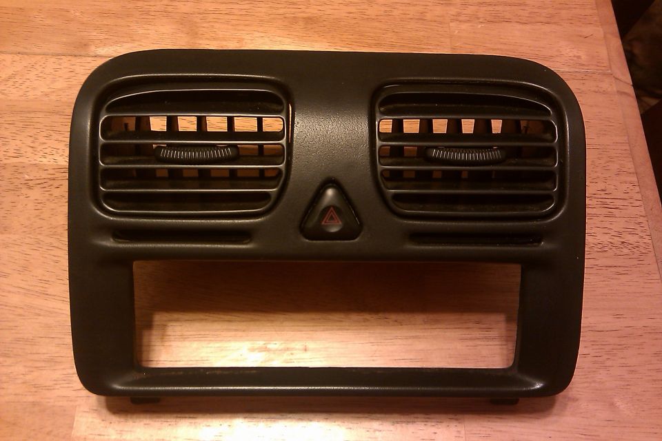 Black center dash vent and radio bezel with hazard light button