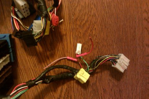 1997 Subaru Legacy - Close-up of an automotive wiring harness with various connectors and wires.