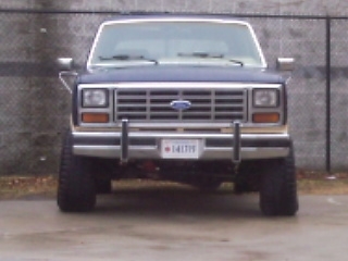 1985 Ford Bronco - Front view of a 1985 Ford Bronco, showing its distinctive grille and headlights.