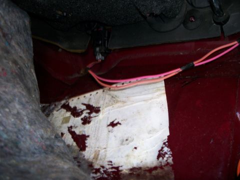 1990 Ford Bronco II - Exposed wiring and interior paneling visible in a vehicle.